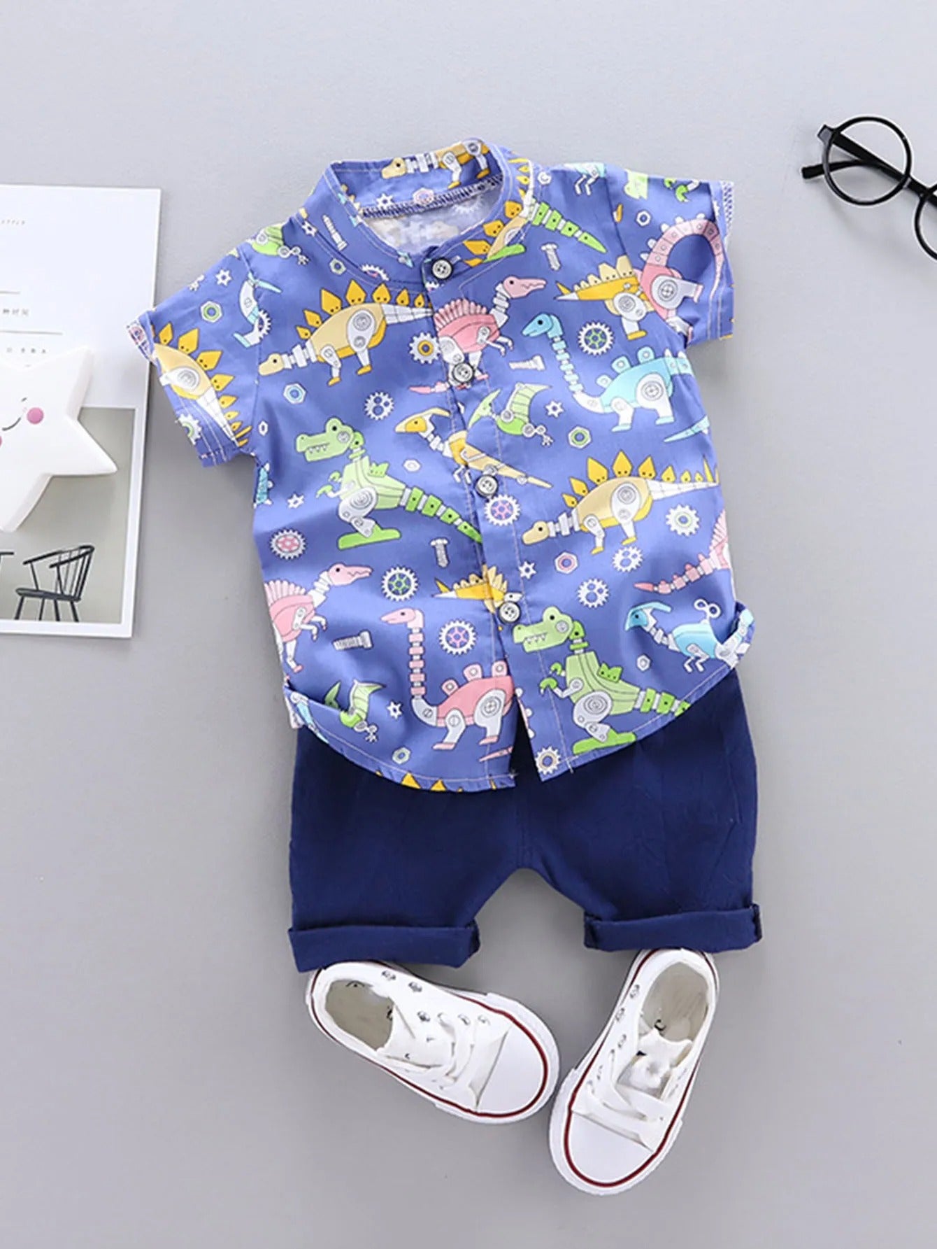 2PCS Toddler Summer Outfit - Dinosaur Print Short-Sleeve Shirt with Standing Collar and Matching Shorts.