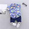 2PCS Toddler Summer Outfit - Dinosaur Print Short-Sleeve Shirt with Standing Collar and Matching Shorts.